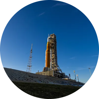 A round crop of the rocket on its launch pad with transparent corners